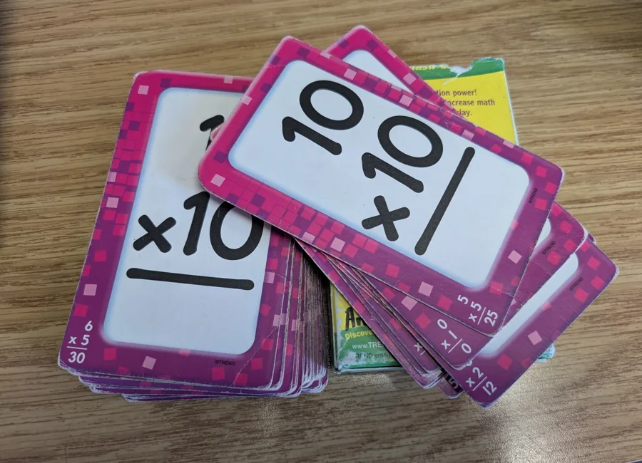 The original physical flashcard decks used in the classroom